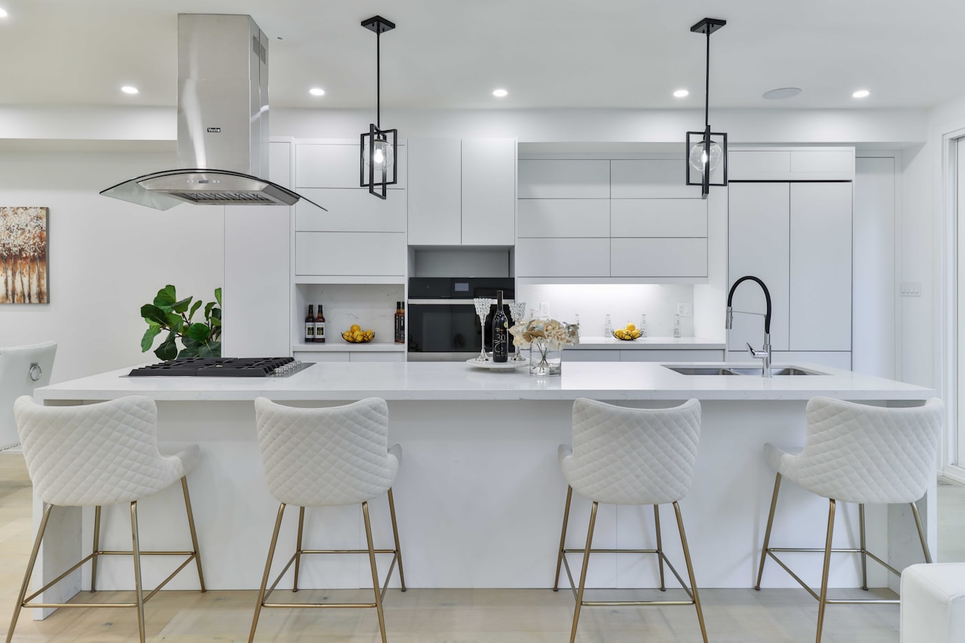 Coogee kitchen island with four timber bar stools.
